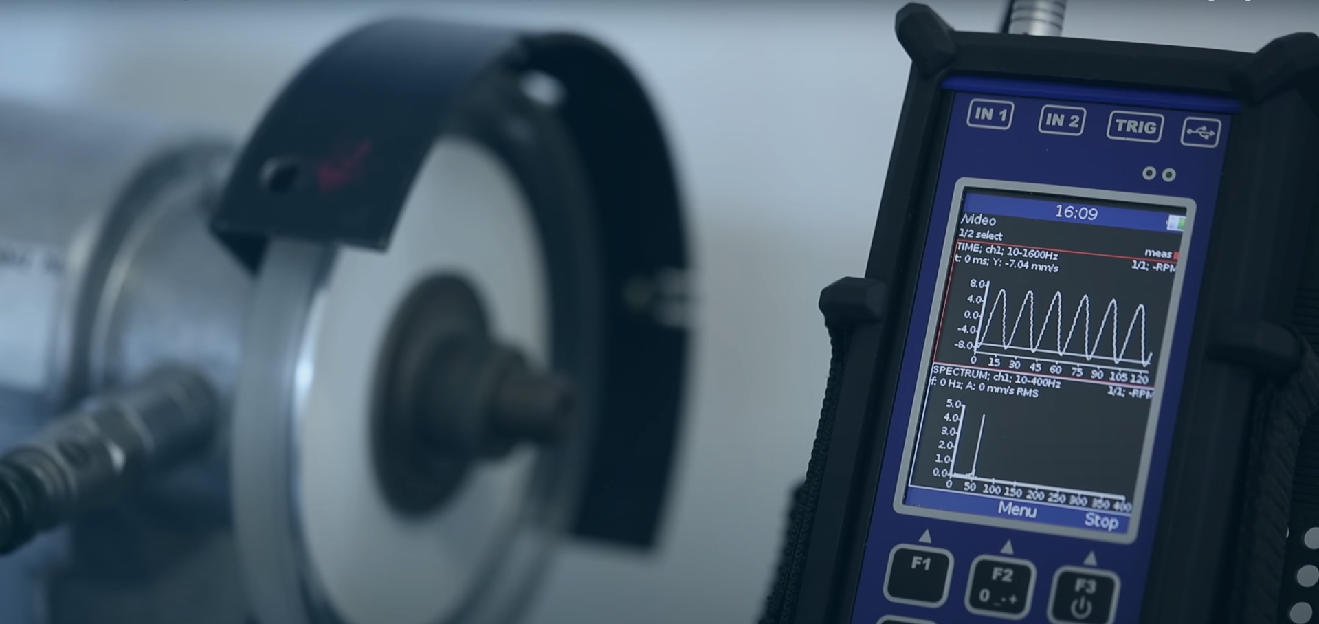 Engineer performing machinery vibration analysis